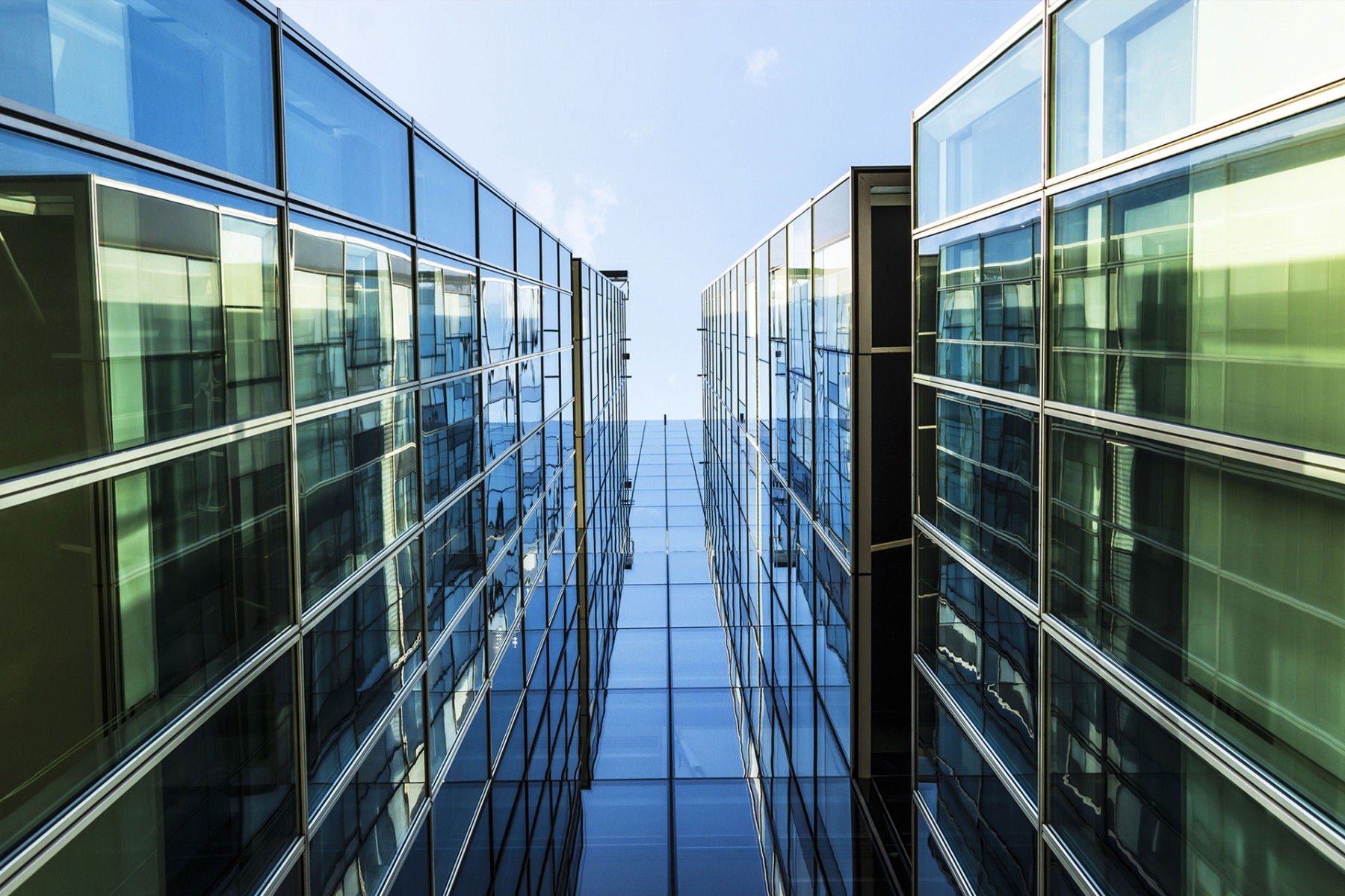 EY Building facade with blue sky